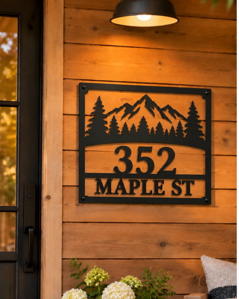 352 Maple Street mountain metal address sign on a cedar porch