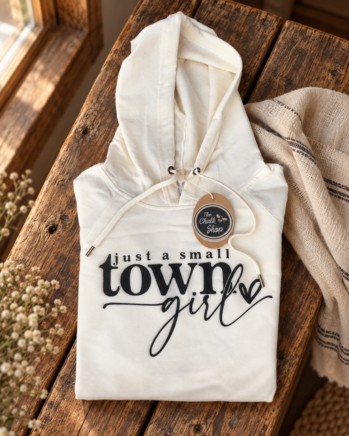 Small Town Girl Hoodie or T-Shirt displayed in a warm styled setting